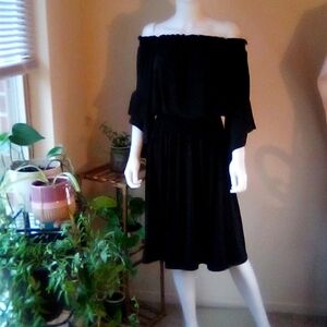 Dress by Ashley Stewart, size 14/16, can be worn pulled down on shoulders. Black
